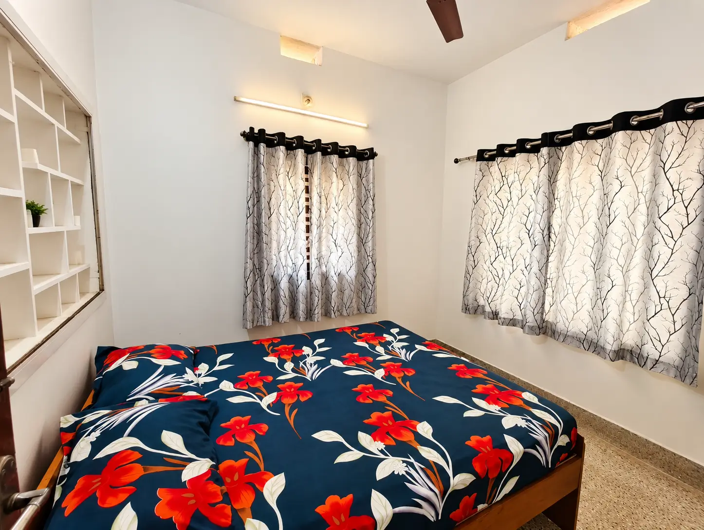 The Indigo Room, a queen bedroom with a courtyard nook